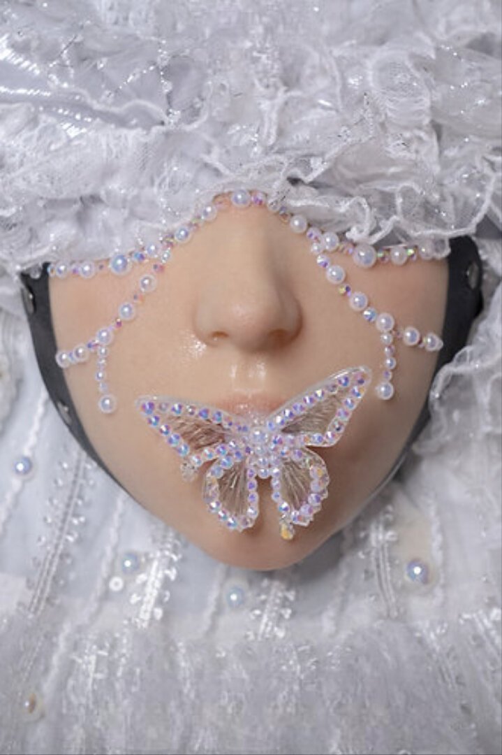 Die Schönheit des Glitters: Illusions-Schmetterling